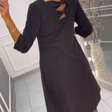 Robe unie avec nœud au dos