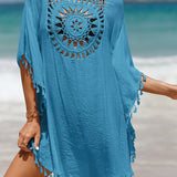 Couverture de plage avec pompons