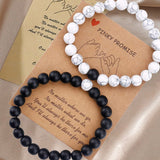 Ensemble de bracelets pour couple tissés en perles noires et blanches