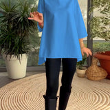 Haut de couleur unie style de déplacement