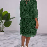 Robe élégante superposée à imprimé pois