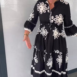 Robe à imprimé floral et manches 3/4