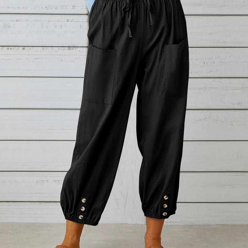 Pantalon taille haute bouton neuf points