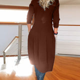 Robe élégante de couleur unie avec poche et col rond