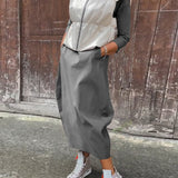 Robe élégante simple à manches longues avec poche de couleur unie