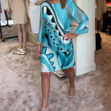 Robe midi imprimée tendance à col rond