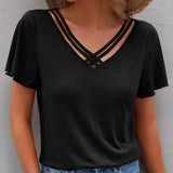 T-shirt à découpes de couleur unie