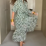 Robe à manches à neuf points à imprimé géométrique