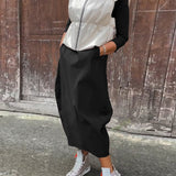 Robe élégante simple à manches longues avec poche de couleur unie