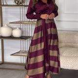 Robe élégante à rayures et à bretelles