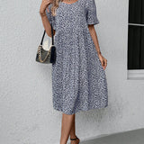Robe élégante à col rond et imprimé floral