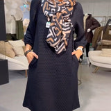 Robe élégante de couleur unie