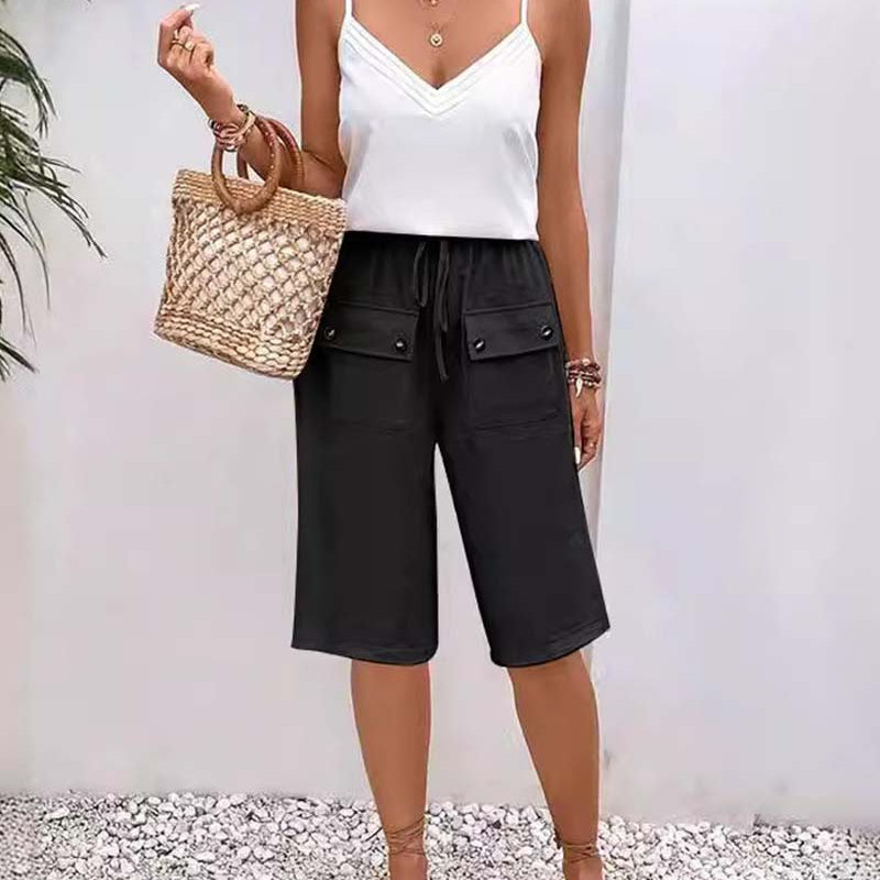 Pantalon mi-long décontracté avec poche de couleur unie