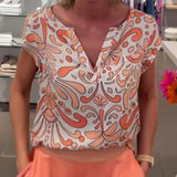 Blouse décontractée imprimée à col en V et manches raglan