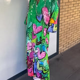 Robe à col en V à imprimé cœur avec manches longues