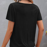 T-shirt à découpes de couleur unie