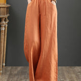 Pantalon large taille haute de couleur unie