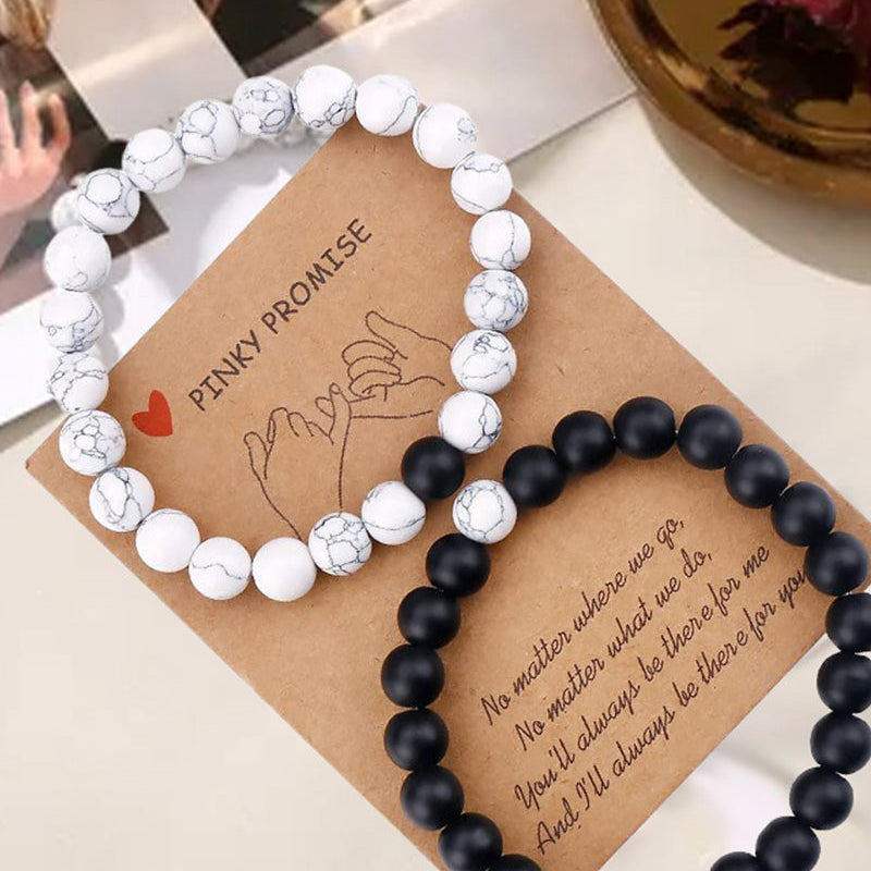 Ensemble de bracelets pour couple tissés en perles noires et blanches
