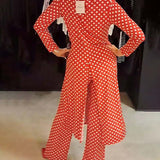 Costume élégant fendu à pois