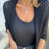 Manteau élégant avec design en tricot ajouré