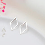 Boucles d'oreilles simples et élégantes en forme de diamant