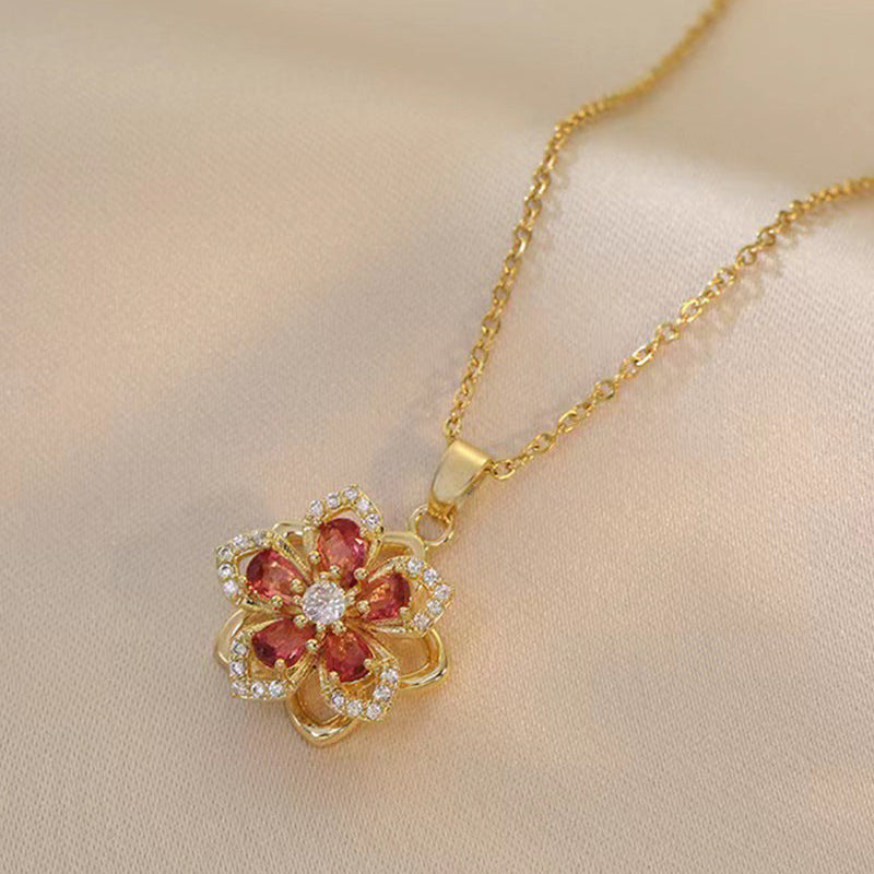 Collier pendentif rotatif à 360° à cinq pétales de fleur