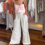 Pantalon large confortable de couleur unie avec poches
