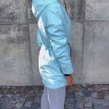 Manteau à fermeture éclair et cordon de serrage