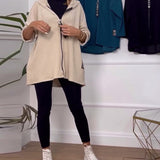 Manteau décontracté à capuche de couleur unie avec fermeture éclair