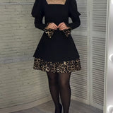 Robe élégante à manches bouffantes et imprimé léopard