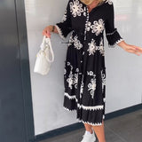 Robe à imprimé floral et manches 3/4