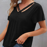 T-shirt à découpes de couleur unie