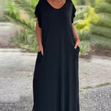Robe longue de couleur unie avec poche et manche courte