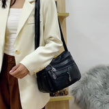 Sac bandoulière en cuir souple avec multipoches
