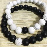 Ensemble de bracelets pour couple tissés en perles noires et blanches