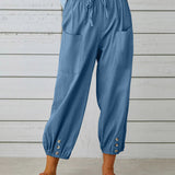 Pantalon taille haute bouton neuf points