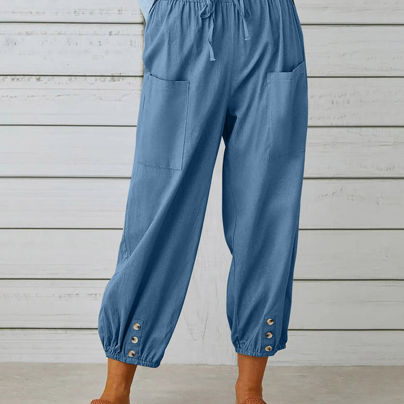 Pantalon taille haute bouton neuf points