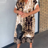 Robe à imprimé géométrique et col en V