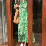 Robe longue à manches courtes imprimée de fleurs