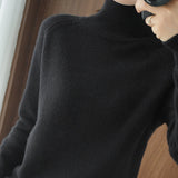 Pull simple à manches longues et col haut de couleur unie