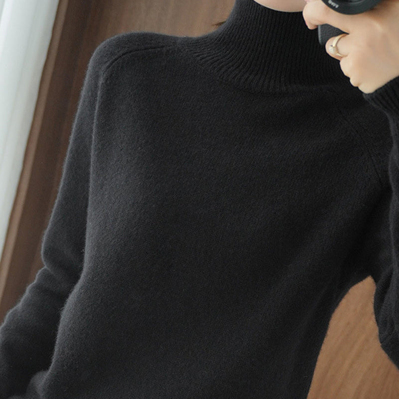 Pull simple à manches longues et col haut de couleur unie