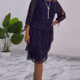 Robe élégante superposée à imprimé pois