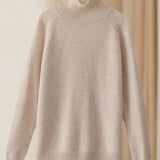 Pull simple à manches longues et col haut de couleur unie
