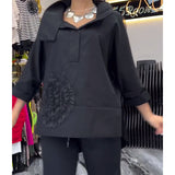 Blouse fleurie patchwork en dentelle à revers