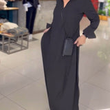Robe longue ample avec revers et fente latérale