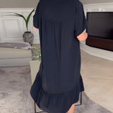Robe ample plissée col V