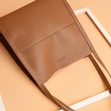 Sac à bandoulière simple de couleur unie