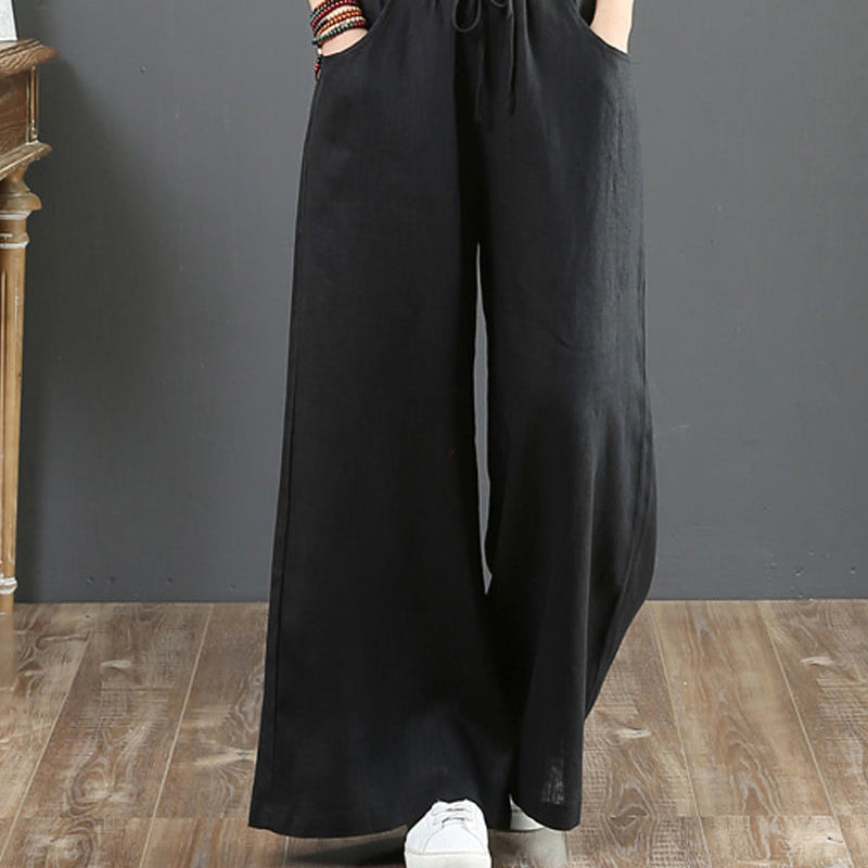 Pantalon large taille haute de couleur unie