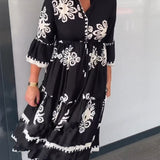 Robe à imprimé floral et manches 3/4