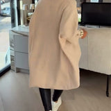 Pull Avec Caractéristiques Col V, Boutonné Et Asymétrique